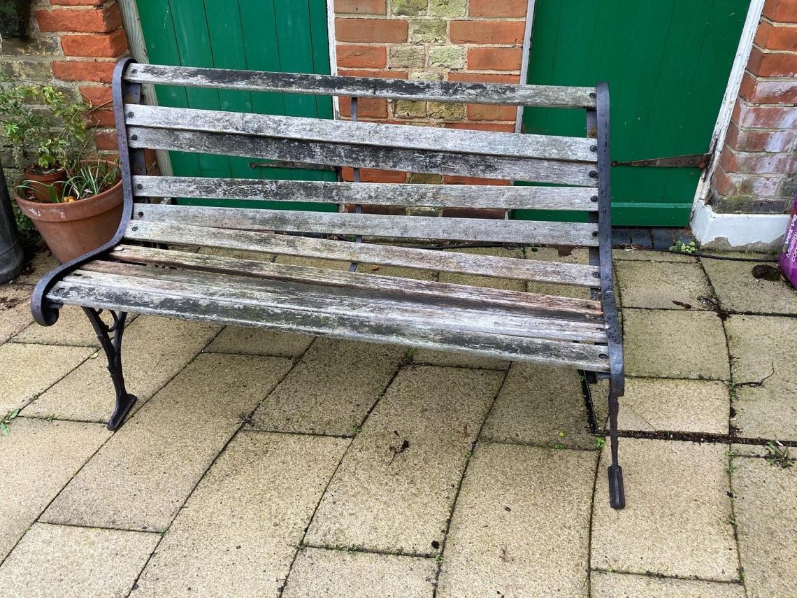 Before restoration. Rusted fixings that damaged adjacent timber.  The slats had never been treated and the bolts had rusted to the bench ends.